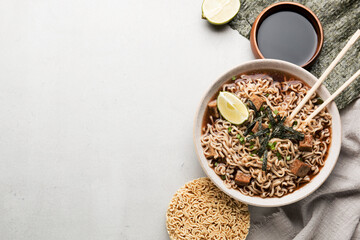 Bowl with soy sauce, Asian noodles, egg ramen and tofu. Traditional Asian dish.