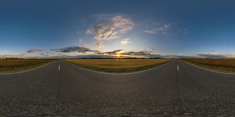 full seamless spherical hdr panorama 360 degrees angle view on asphalt road among fields in summer evening sunset with awesome clouds in equirectangular projection, ready for VR AR virtual reality