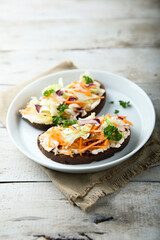 Homemade toast with cream cheese and vegetables