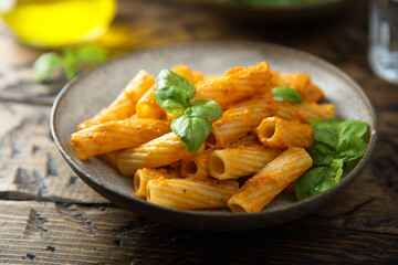 Pasta with red pesto and cheese