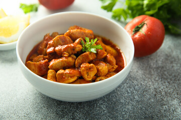 Traditional homemade chicken ragout with tomato sauce