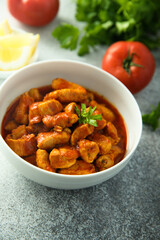 Traditional homemade chicken ragout with tomato sauce