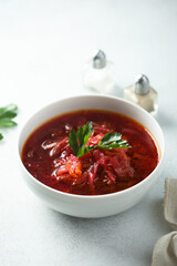 Traditional homemade beetroot soup with fresh parsley
