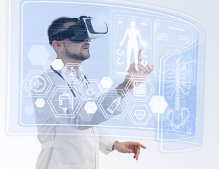 Medical technology concept. Doctor using virtual reality headset to study health data of patient