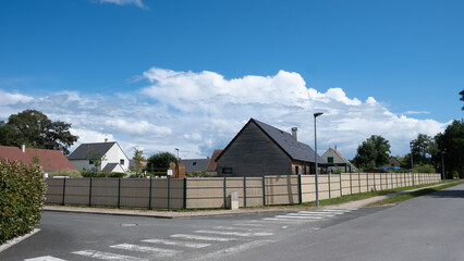 Typical french house in the countryside and its hedgerow