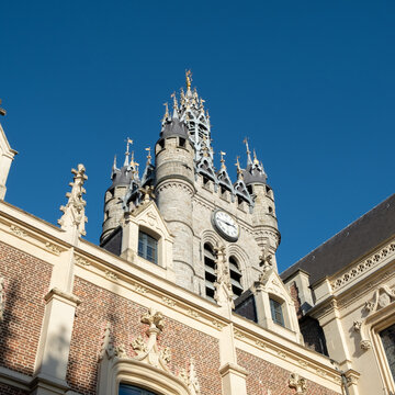 detail of the capitol of Douai, historic tower and facade