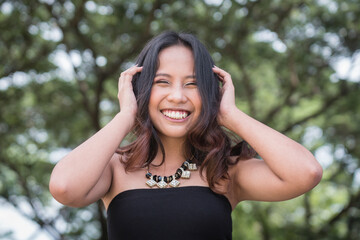 A young Filipina with a great personality. Having a great time outdoors.