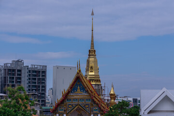 Buddhist temple Was on Sukhumvitt Rd BKK Bangkok Thailand, vivid lush colours if the buildings are glorious