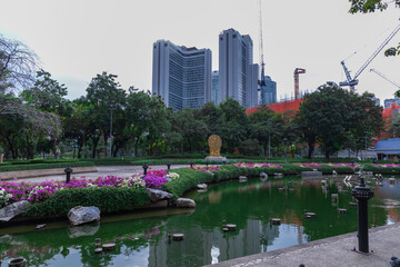 Buddhist temple Was on Sukhumvitt Rd BKK Bangkok Thailand, vivid lush colours if the buildings are glorious