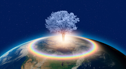 Planet Earth with blue lone tree and rainbow spectacular sunset in the background "Elements of this image furnished by NASA"