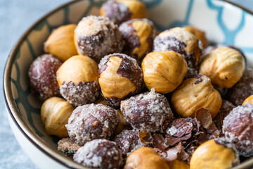 Salted and Roasted Hazelnuts in Bowl. Ready to Eat.