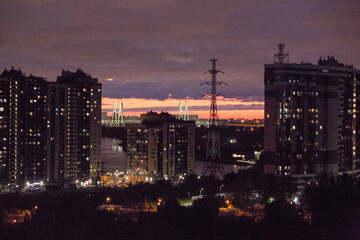 Fototapeta na wymiar high-rise residential building close-up, night photo 