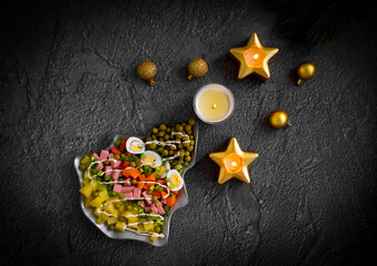 Olivier salad in a plate festive background