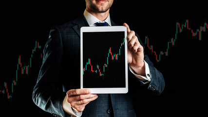 Shares financial. Businessman holding finance application for sell, buy and analysis profit...