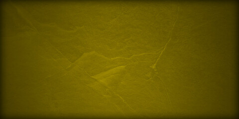 Fondo amarillo de pared con grietas en degradado.