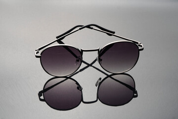 sunglasses on a black background.