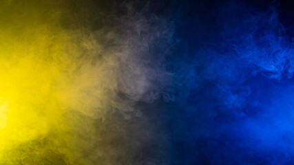 Yellow-blue smoke in neon light on black background. - Powered by Adobe