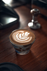 Selective focus cup of hot latte art coffee