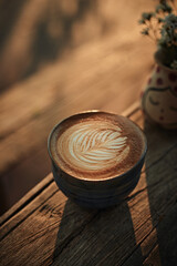 Selective focus cup of hot latte art coffee