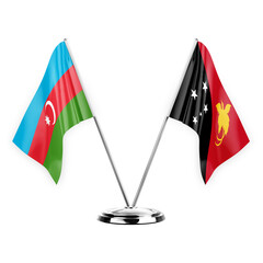 Two table flags isolated on white background 3d illustration, azerbaijan and papua new guinea