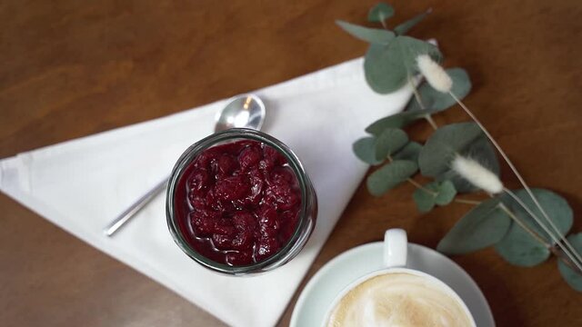 Delicious dessert with cherries in a glass