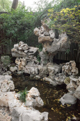 Fototapeta na wymiar Rocks and pond at Hanshan Temple, in Suzhou, China