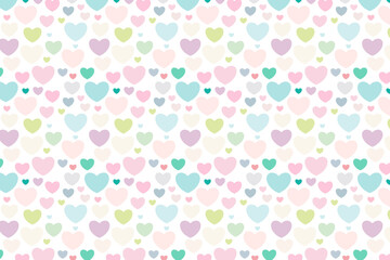 Multicolored hearts of different sizes. Pastel colors seamless repeating pattern. Valentines day background.