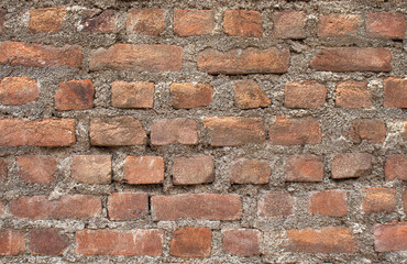 Old brick wall with red brick Background of brick wall texture red stone wall pattern.