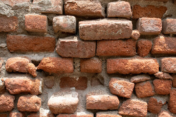 Fototapeta premium Old brick wall with red brick Background of brick wall texture red stone wall pattern.