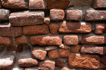 Old brick wall with red brick Background of brick wall texture red stone wall pattern.