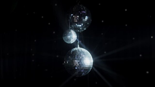 Disco Ball Mirrors Spin PAL. the ball spins and sparkles as it spins in a perfect loop. Loops smoothly. Disco mirror ball in the center of the smoke.