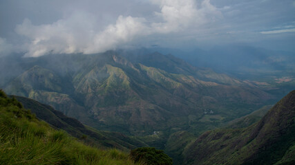 Amazing mountain landscape with clouds, tea estate natural outdoor travel background. Beauty world.