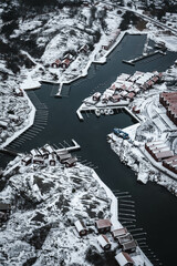 snow covered fishing town by the sea in the swedish archipelago
