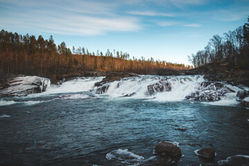 Spectacular Malselvfossen waterfall on the Malselva River in northern Norway, on the Scandinavian...