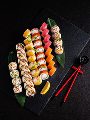 tasty sushi on the black background