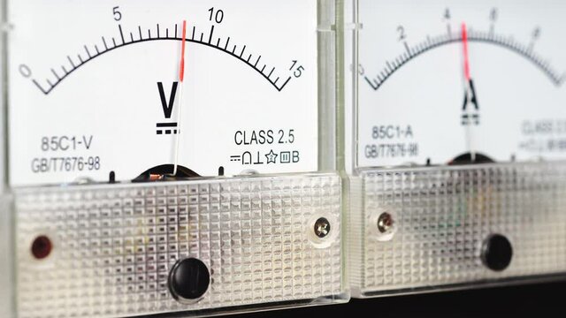 Arrow of the analog DC voltmeter shows the value volts.                      