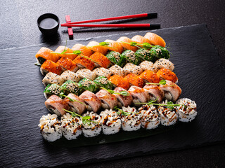 tasty sushi on the black background