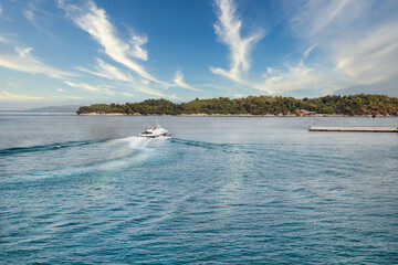 Hydrofoil passenger ship goes towards the island. Corfu, Greece.