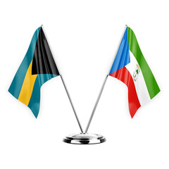 Two table flags isolated on white background 3d illustration, bahamas and equatorial guinea