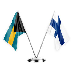 Two table flags isolated on white background 3d illustration, bahamas and finland