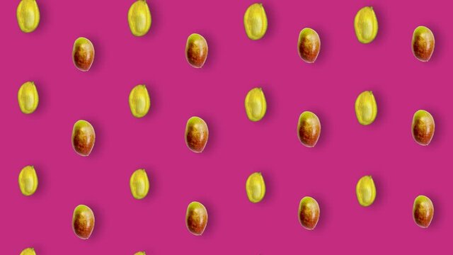 Colorful fruit pattern of fresh mango on pink background. Seamless pattern with mango. Realistic animation. 4K video motion