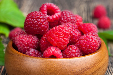 harvested red raspberries, close up
