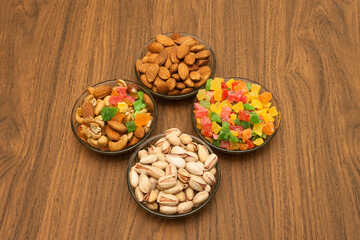 Nuts and snacks, a snack for beer on a dark background.