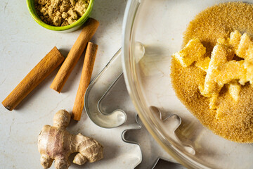 Gingerbread ingredients and accessories for making ginger dough.