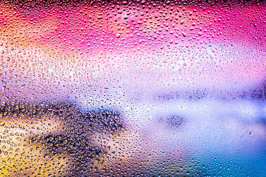 Beautiful background with drops on glass. Fresh background with raindrops
