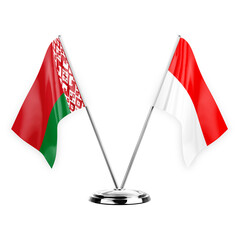 Two table flags isolated on white background 3d illustration, belarus and indonesia