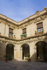 Fototapeta na wymiar Courtyard of Episcopal Palace in Murcia, Spain 