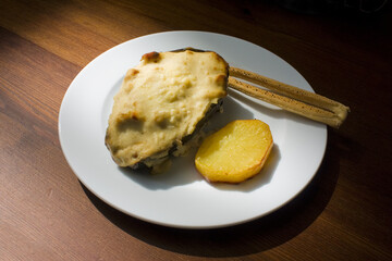 Typical spanish eggplant dish baked with meat and cheese