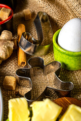 Gingerbread ingredients and accessories for making ginger dough.