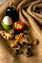 Gingerbread ingredients and accessories for making ginger dough.